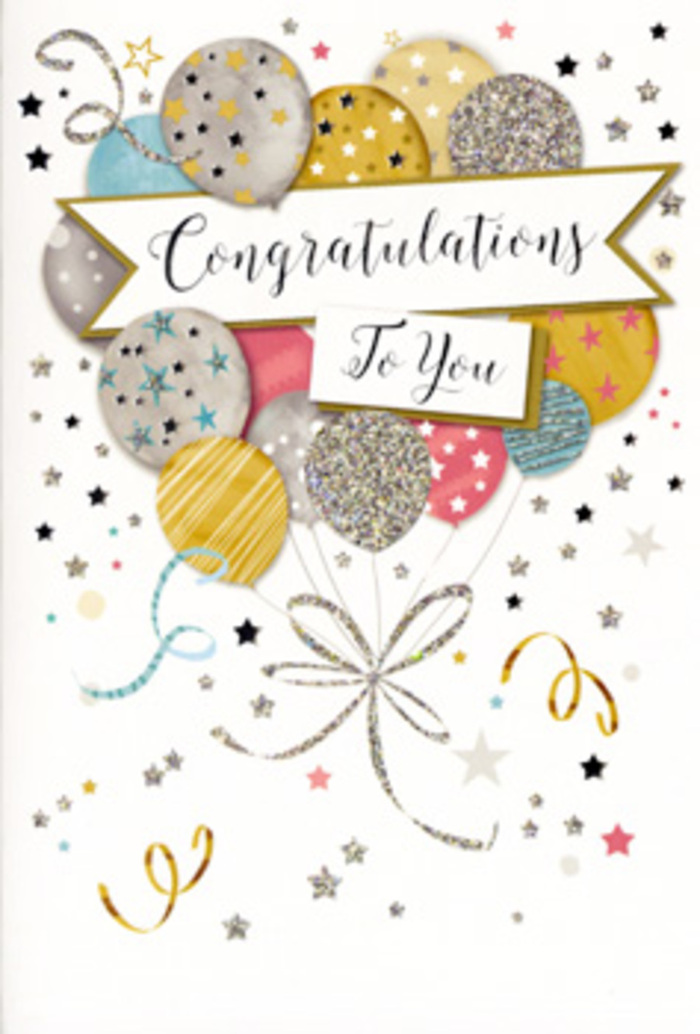 This congratulations card is captured in close detail, revealing a design that feels as celebratory as a fresh bouquet ready for delivery across Yeading. At its centre is a generous cluster of balloons, gathered like stems in a hand-tied arrangement. The balloons fill the upper half of the card, overlapping in soft layers of colour: muted gold, antique silver, champagne beige, sky blue, blush pink and gentle grey. Each balloon bears its own decoration-fine bands of glitter, tiny star motifs and delicate speckles of metallic shimmer-bringing to mind how a florist might mix textures and shapes to keep the eye moving. Slim, curling strings in metallic gold and silver trail downwards, looping elegantly before coming together, giving a subtle sense of motion as though the balloons are constantly lifting toward the top edge of the card. Scattered around them are stylised stars and loose party ribbons, printed in sparkling metallic inks that echo the spontaneous joy of a surprise celebration, the way friends in Yeading might gather after work or school to toast a success. Cutting across the middle of the balloon cluster is a soft banner ribbon, gently arched and carrying the message "Congratulations To You" in graceful, slightly flourished script. The background is a clean, pale tone, allowing the metallic accents and pastel shades to glow softly, much like flowers set against crisp wrapping paper. The atmosphere is warm, elegant and quietly exuberant, ideal for pairing with a congratulatory bouquet delivered to homes near Yeading Lane or to offices and schools in the surrounding streets, marking achievements with both visual charm and heartfelt sentiment.