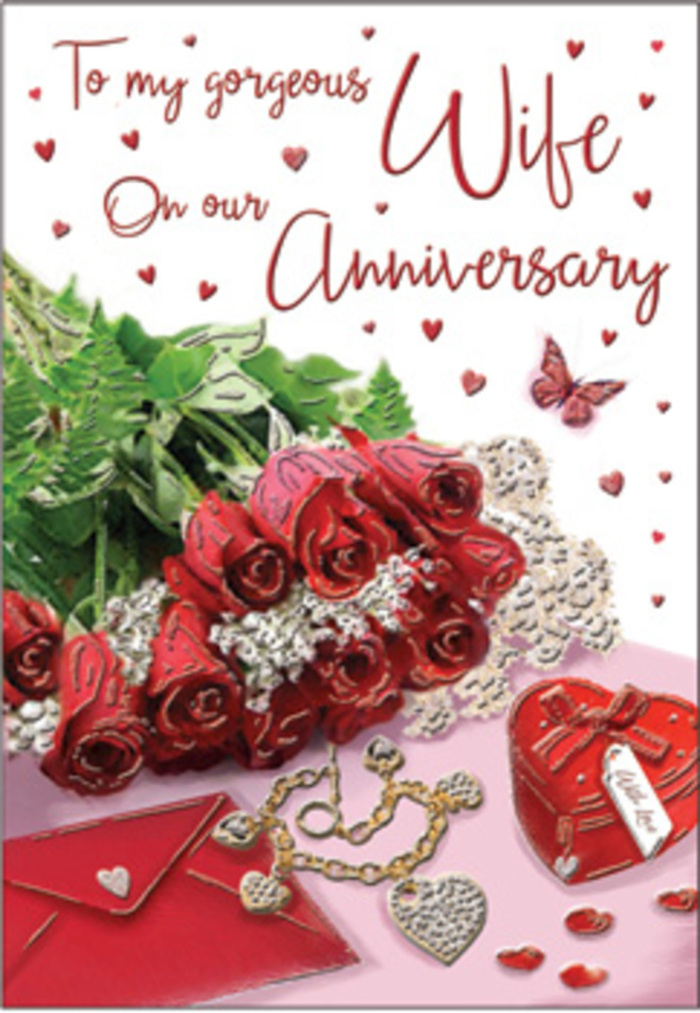 In this richly emotive anniversary card design, a bouquet of classic red roses takes centre stage, each bloom full, velvety, and carefully arranged as if by an expert florist who understands the language of romance. The roses are wrapped with subtle elegance and supported by fresh greenery, their deep crimson colour reassuring and bold, like a steady heartbeat. Around them, the scene is gently dressed with symbolic treasures: a delicate jewellery set, a vivid red heart-shaped box, and a neatly placed envelope that seems ready to carry a message of love across Yeading. Fine lace-like patterns and slender heart motifs weave through the background, catching the eye in the same way shopfront lights glimmer along Yeading Lane on winter evenings. Hints of gold from the jewellery and soft reflections on the surface below add warmth and luxury, while the tiny scattered hearts provide an almost festive sparkle. The card's script is beautifully curved and flowing, suggesting a carefully chosen message, even if the exact words are not legible in the image. Soft light falls across the arrangement, highlighting the rich textures of velvet petals, polished metal, and smooth card, creating a feeling of comfort and closeness. The entire composition evokes cherished moments shared over many years-quiet dinners at home, walks through nearby parks, and traditions kept between partners. It feels like an intimate tribute to lasting love, the sort of card that might accompany a surprise bouquet delivered to a doorstep in Yeading, turning an ordinary day into a treasured memory.